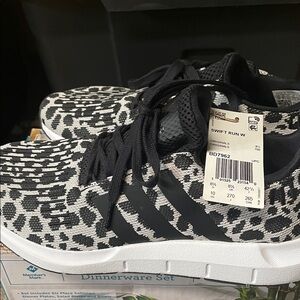 Women’s size 10 Adidas Swift Run Black and White Animal Print Sneakers